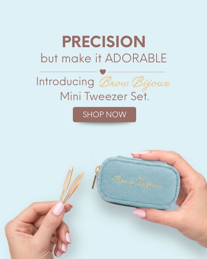 Brown Bijoux Mini Tweezer Set Product, showing a light blue fabric zippered case held by a hand alongside wooden-handled tweezers, with marketing text on a pale blue background.