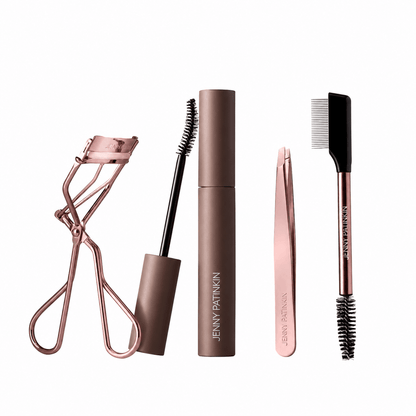 Jenny Patinkin Big Reveal eye beauty bundle featuring eyelash curler, mascara, slanted tweezers, and dual-ended lash and brow comb